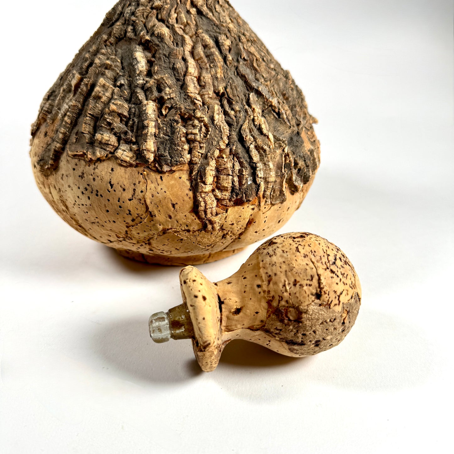 Glass Bottle covered in bark-like cork