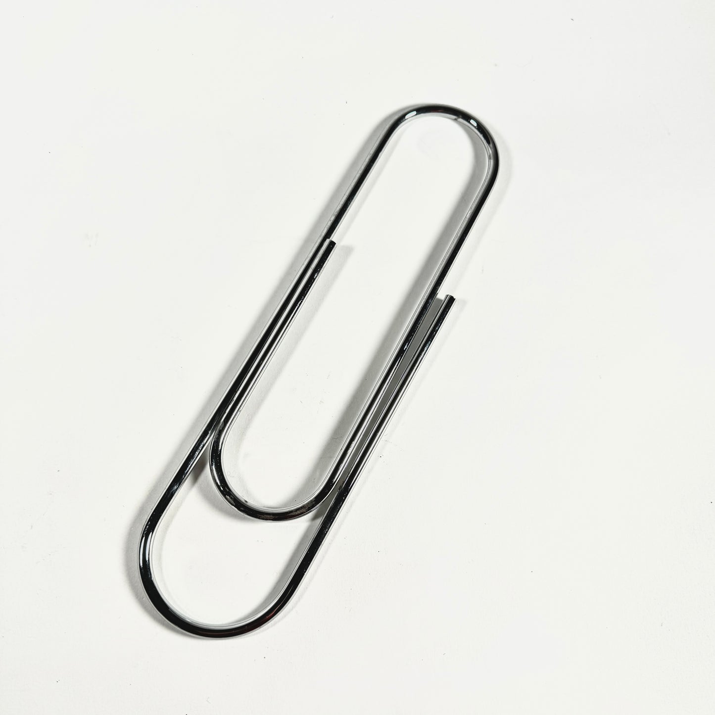 OVERSIZED VINTAGE CHROME PAPER CLIP