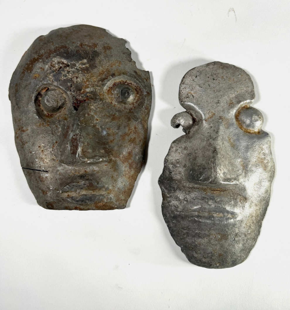 Vintage Metal Faces Off Castings