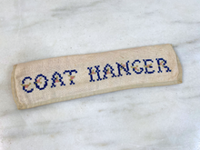 Load image into Gallery viewer, Antique Traveling Coat Hangers with handmade X-Stitched Case
